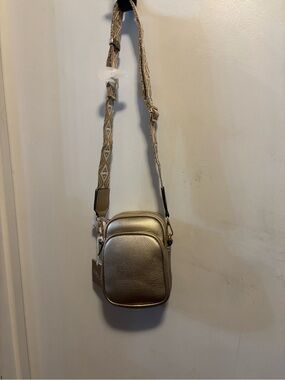 Compact Metallic Gold Crossbody Bag with Patterned Strap